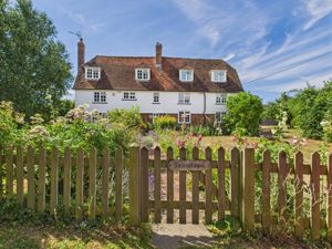 Front photo with gate - click for photo gallery